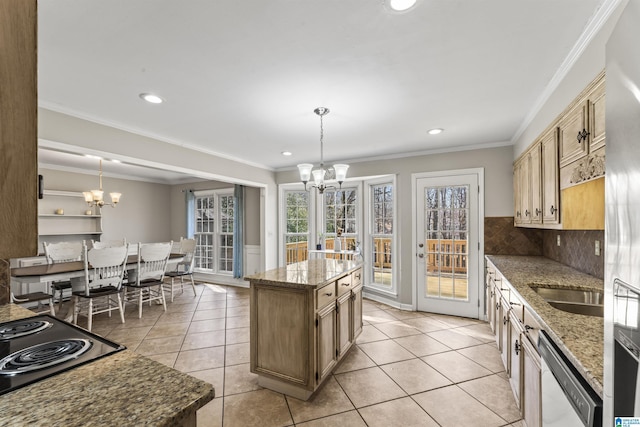 kitchen with decorative light fixtures, a chandelier, and a kitchen island