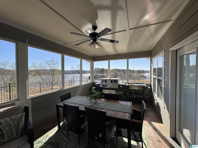 sunroom / solarium with ceiling fan