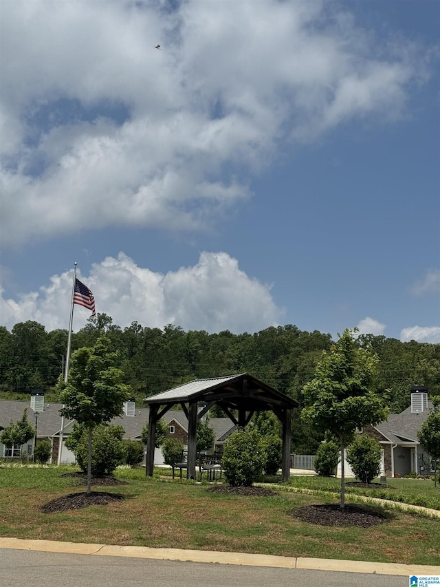 view of property's community featuring a gazebo and a yard