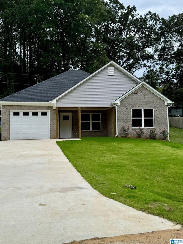 ranch-style house with a garage and a front lawn