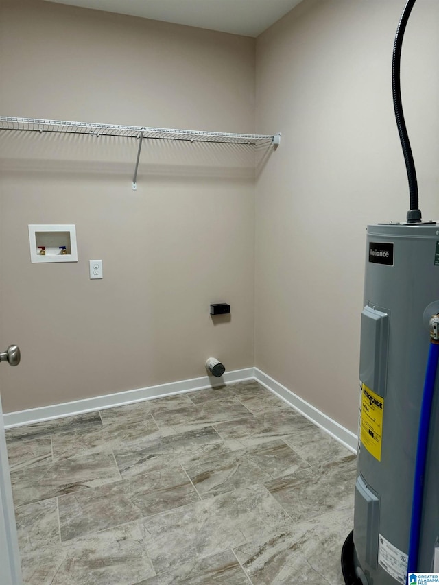 clothes washing area with electric dryer hookup, electric water heater, and washer hookup