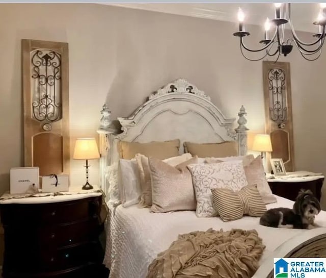 bedroom with a chandelier