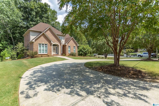 view of front of house with a front lawn