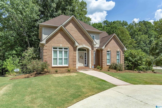 view of property featuring a front yard