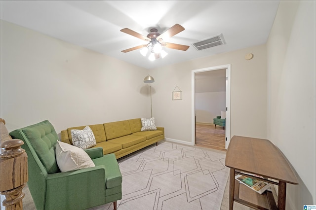 living room with ceiling fan