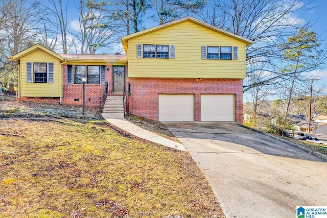 split level home featuring a garage