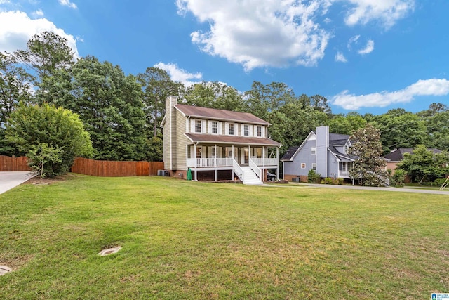 view of front facade featuring a front lawn and a porch