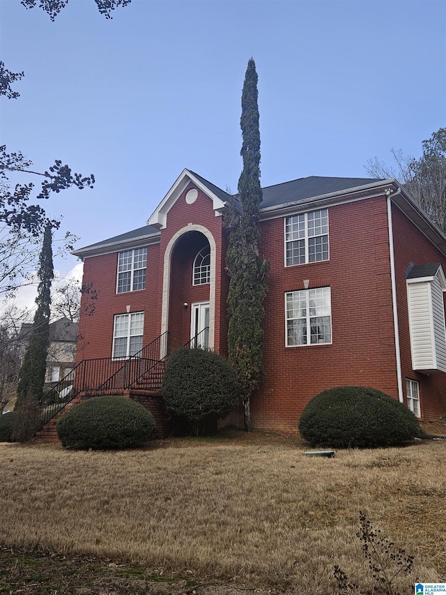 view of front of home with a front yard