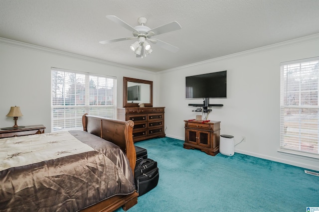 bedroom featuring crown molding, carpet flooring, multiple windows, and a textured ceiling