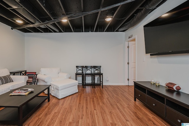 living room with light hardwood / wood-style flooring