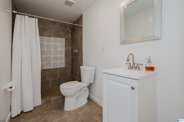 bathroom featuring a shower with curtain, vanity, and toilet