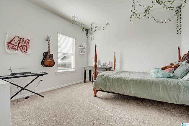 bedroom featuring carpet