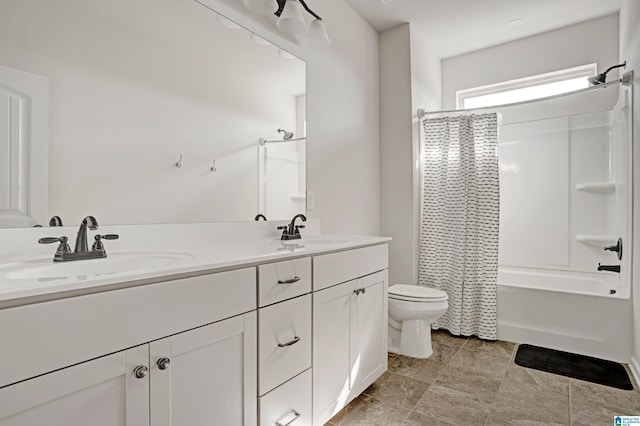 full bathroom with shower / bathtub combination with curtain, vanity, and toilet