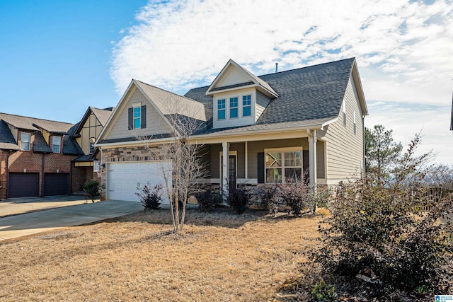 craftsman inspired home with a garage and a porch