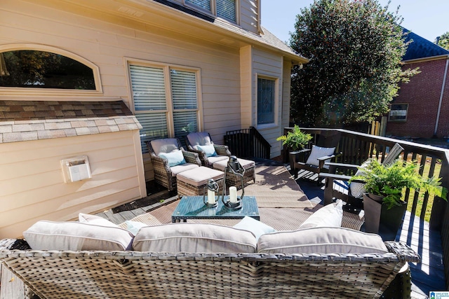 wooden terrace featuring an outdoor living space