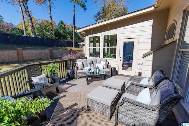 wooden deck featuring an outdoor living space