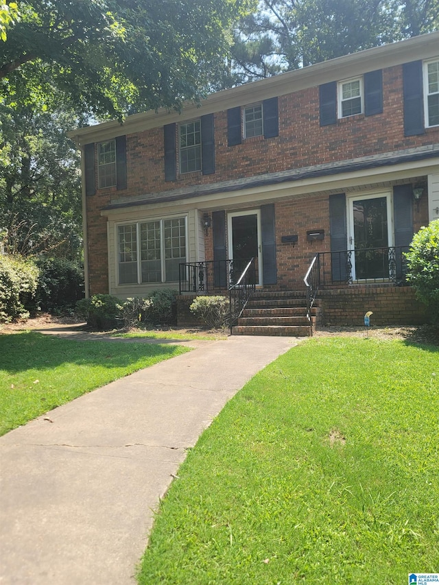 view of front of property with a front lawn