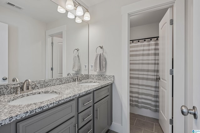 bathroom with vanity, tile patterned floors, and a shower with shower curtain