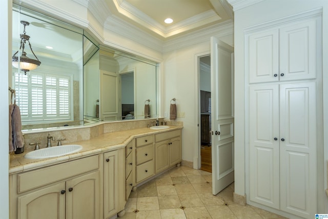 bathroom featuring vanity, crown molding, and tile patterned floors