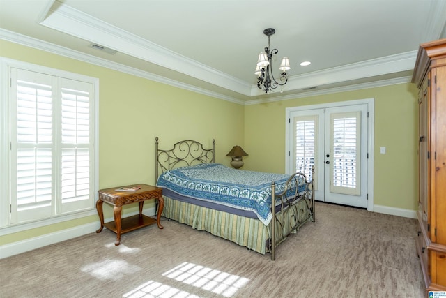 carpeted bedroom featuring crown molding, access to outside, french doors, and a chandelier