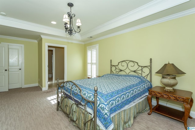 carpeted bedroom featuring crown molding and a notable chandelier