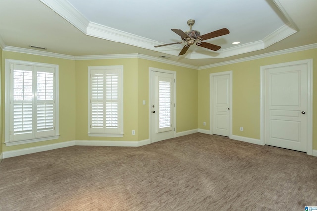 interior space with crown molding, plenty of natural light, and ceiling fan