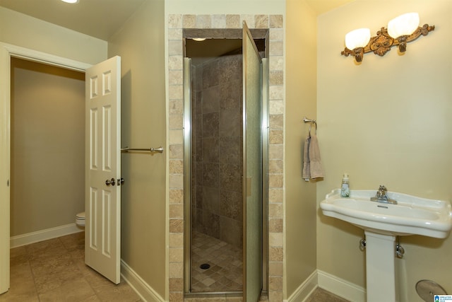 bathroom with walk in shower and toilet