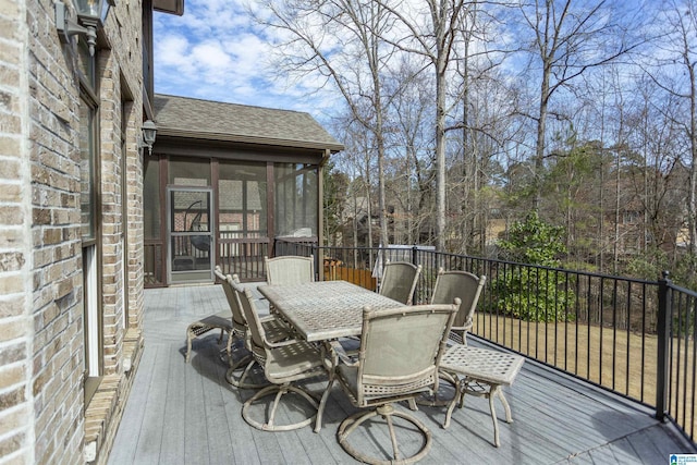 deck with a sunroom