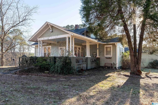 view of front of property featuring covered porch