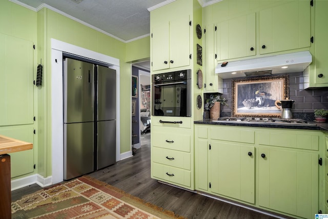 kitchen featuring crown molding, appliances with stainless steel finishes, dark hardwood / wood-style flooring, and decorative backsplash