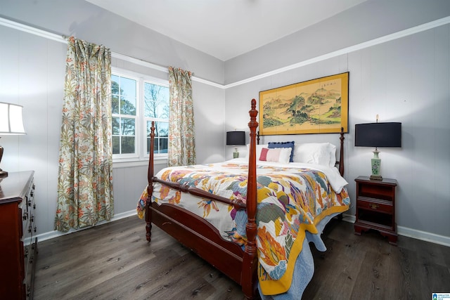 bedroom featuring dark hardwood / wood-style flooring