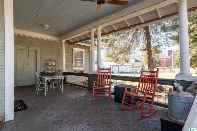 view of patio featuring ceiling fan