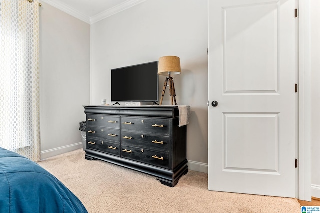 carpeted bedroom featuring crown molding