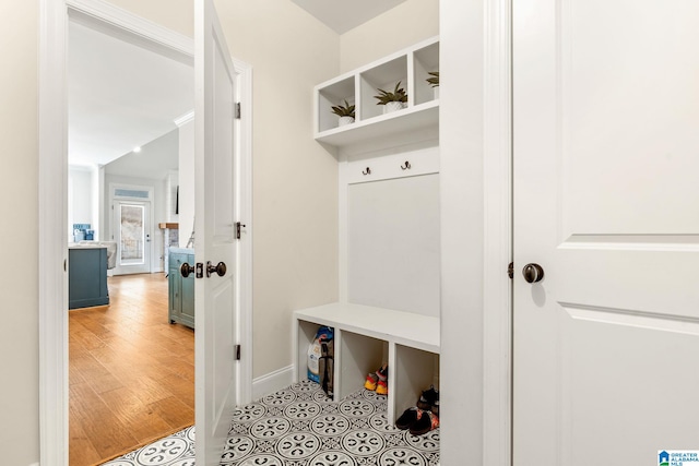 mudroom featuring wood-type flooring