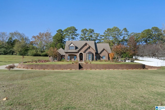 view of front of house with a front yard