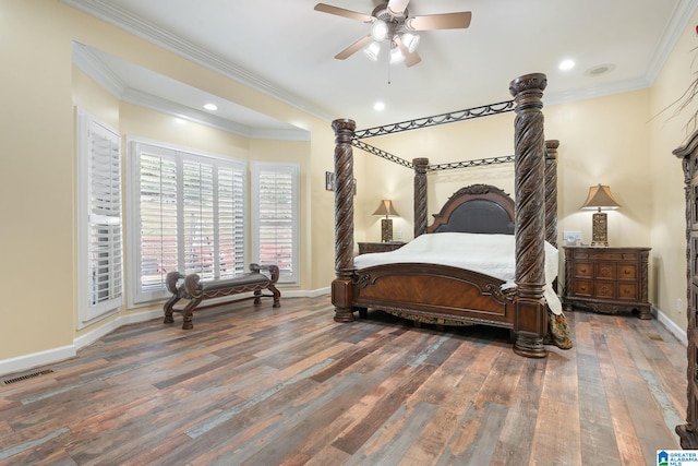 bedroom with hardwood / wood-style flooring, ornamental molding, and ceiling fan