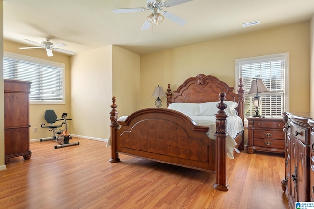 bedroom featuring ceiling fan and light wood-type flooring