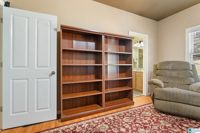 living area with light hardwood / wood-style flooring