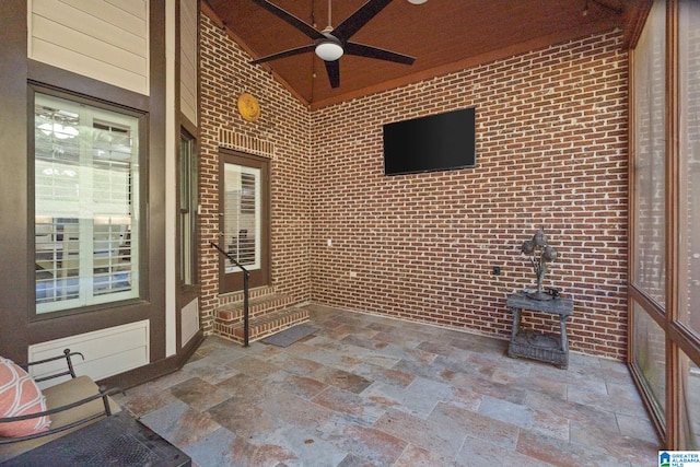 view of patio featuring ceiling fan