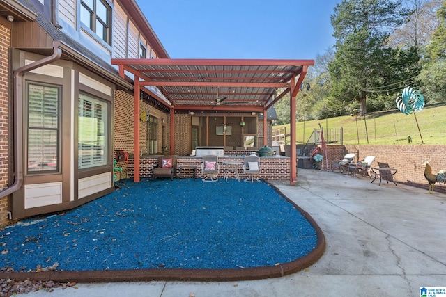 view of patio / terrace featuring a pergola and ceiling fan