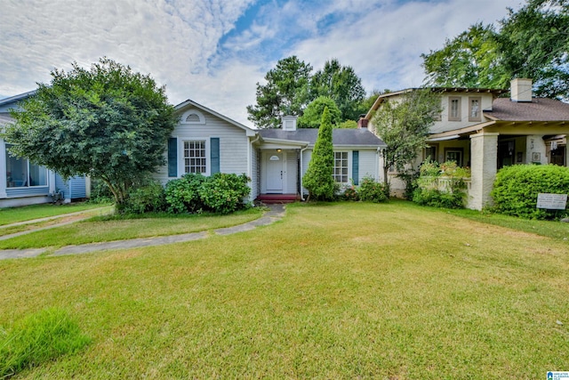 view of front of house with a front lawn