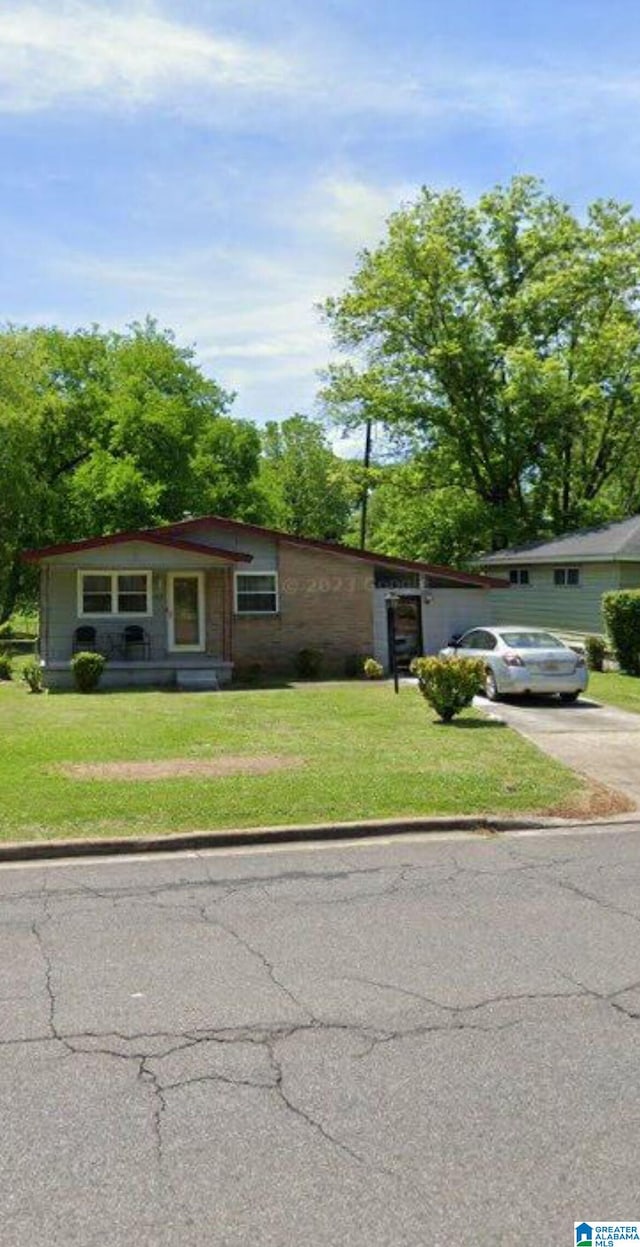 view of front of home with a front yard