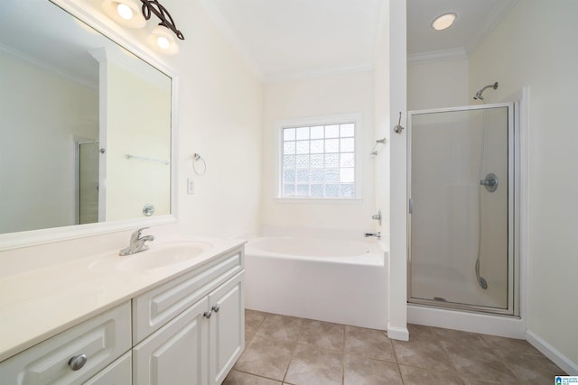 bathroom with tile patterned flooring, ornamental molding, separate shower and tub, and vanity