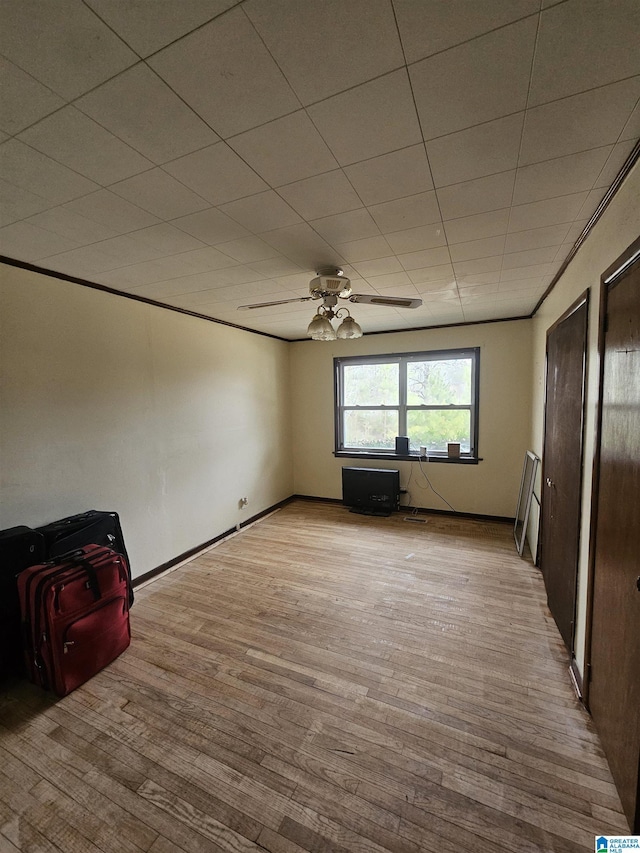 unfurnished room featuring light hardwood / wood-style floors and ceiling fan