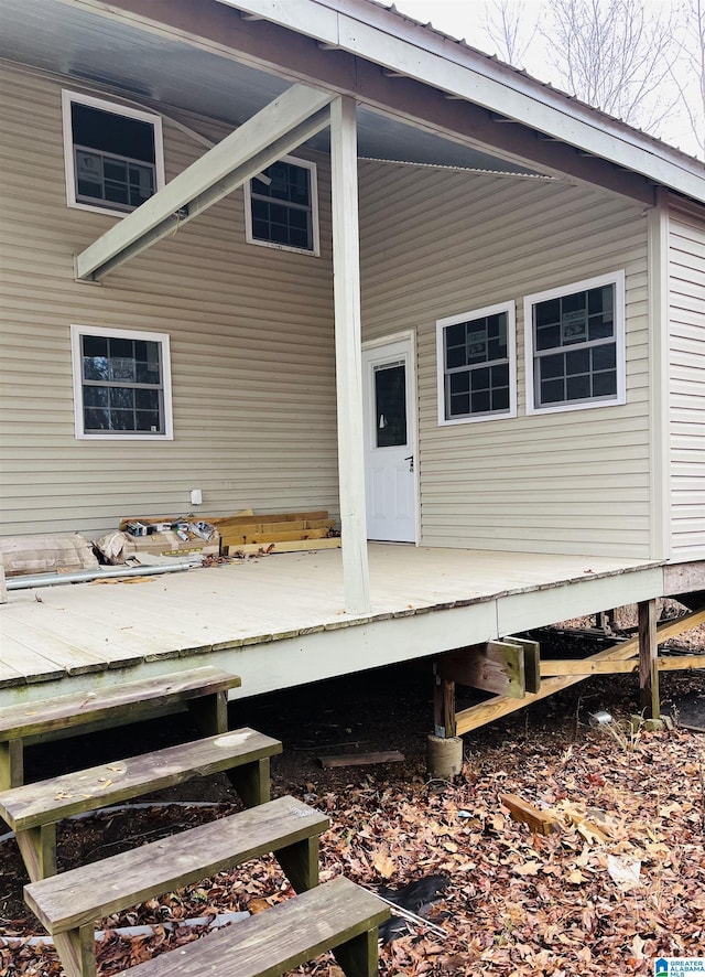 entrance to property with a deck