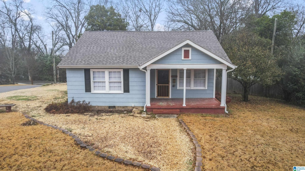 bungalow-style home with a porch