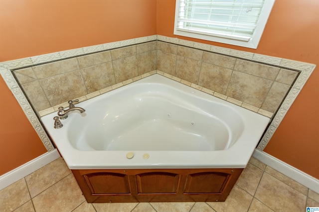 bathroom featuring a tub to relax in and tile patterned flooring