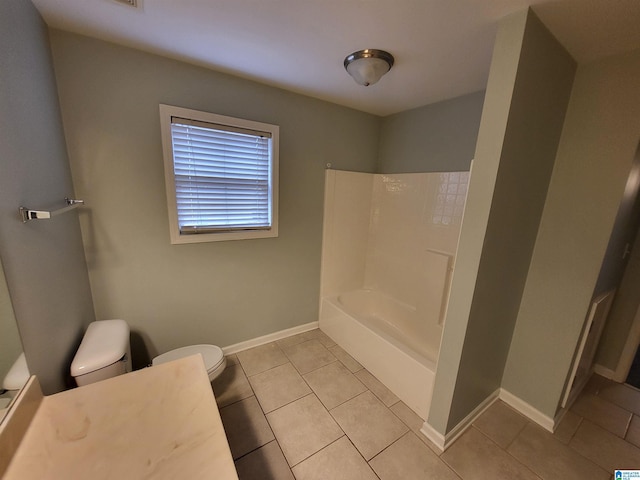 bathroom with toilet, tile patterned flooring, and shower with separate bathtub