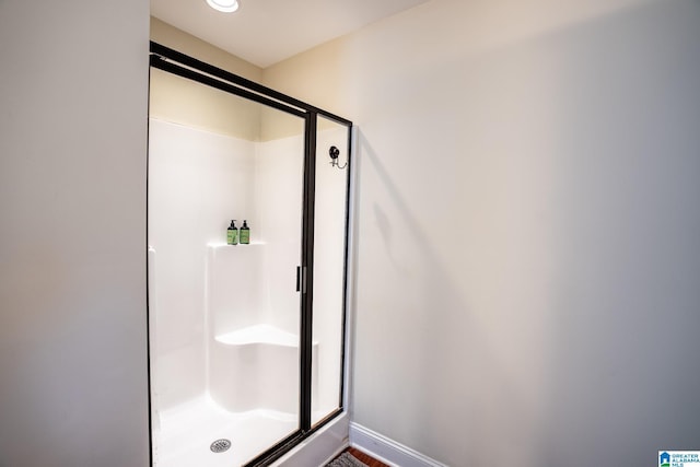 bathroom with an enclosed shower