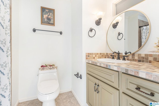 bathroom with vanity, toilet, tile patterned flooring, and decorative backsplash